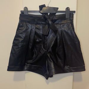 Black leather shorts with belt